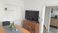 Esszimmer mit Fernseher